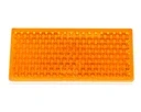 Odblask pomarańczowy prostokątny przyklejany 105x48mm